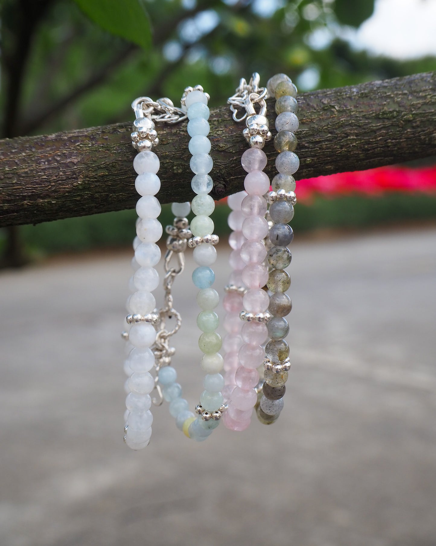 Handcrafted gemstone bracelets with aquamarine, moonstone, rose quartz, and labradorite beads - silver details, designed by elswre