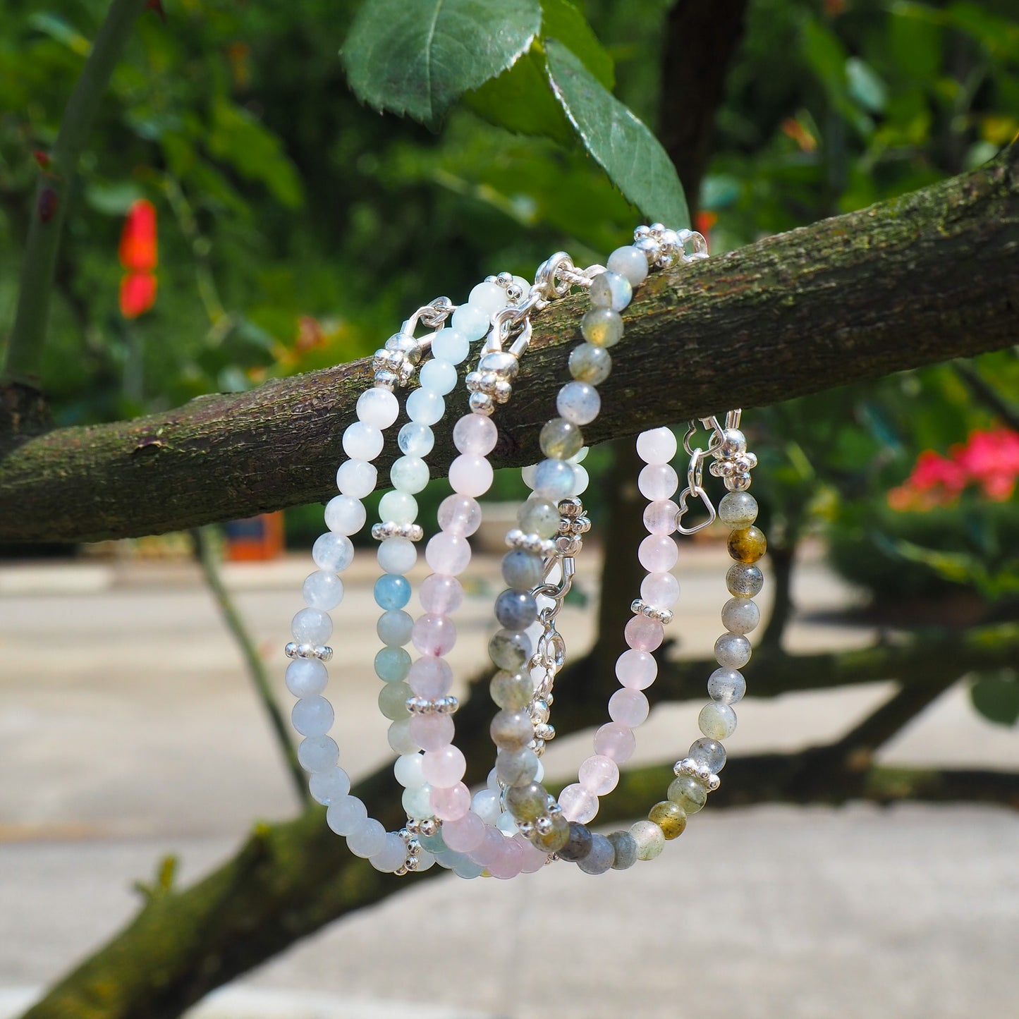 Handcrafted gemstone bracelets with aquamarine, moonstone, rose quartz, and labradorite beads – silver details, designed by elswre